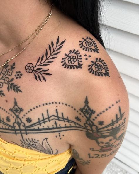 Collar Bone Tattoo American Traditional, Shoulder Cap Tattoo Traditional, Mexican Folk Tattoo, American Traditional Chest Tattoo Women, Cohesive Tattoos, Traditional Shoulder Cap Tattoo, Traditional Shoulder Tattoos For Women, Charm Tattoo Ideas, Chest Ornamental Tattoo