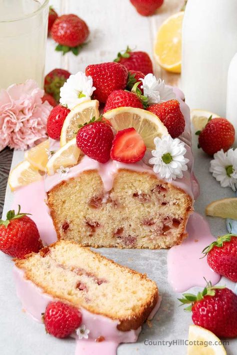 This easy homemade strawberry lemonade pound cake is the perfect combination of fruity flavors and a tender, moist texture. It's loaded with sweet strawberry chunks and drizzled with a delicious lemonade icing! The loaf is loaded with juicy strawberry bits and a sweet, buttery flavor. The addition of lemon juice and lemonade takes the taste to the next level. The loaf recipe is rich enough to be satisfying and perfect for dessert and even breakfast and snacking. | CountryHillCottage.com Strawberry Lemonade Pound Cake, Strawberry Lemon Cake, Strawberry Lemonade Cake, Homemade Strawberry Lemonade, Lemon Loaf Recipe, Strawberry Icing, Strawberry Cobbler, Strawberry Bread, Berry Recipes