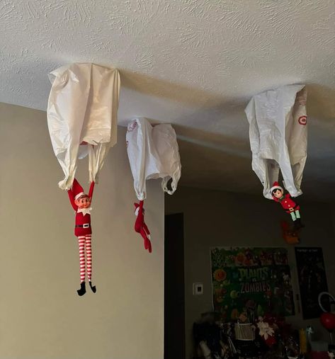 Elves Returning Ideas, Elf On Shelf Messy Ideas, Funny Kids Elf On The Shelf Ideas, Elf Scene Ideas, Elf On The Shelf Debut Ideas, Elf On The Shelf Arrival Ideas Window, Elf Parachute Diy, Elf On The Shelf Ideas Nursery, Elf On The Shelf Business Ideas