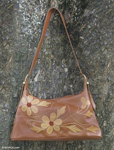 Artisans from the Mãos da Prata Association combine warm brown and tan for this charming shoulder #bag. Handmade Brown Handheld Hobo Bag, Handheld Brown Hobo Bag Handmade, Embroidered Brown Tote Hobo Bag, Embroidered Brown Hobo Tote Bag, Embroidered Brown Hobo Bag, Daily Use Brown Embroidered Hobo Bag, Embroidered Brown Hobo Shoulder Bag, Brown Embroidered Hobo Shoulder Bag, Embroidered Brown Tote Satchel