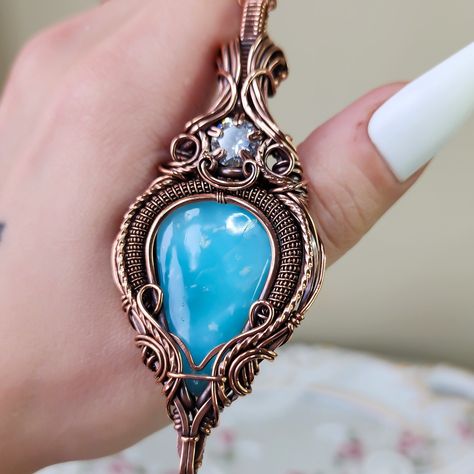 This hemimorphite with a cubic zirconia accent necklace is wrapped in copper wire that has been shaped, hammered, filed, sanded, antiqued, and polished by hand, and comes on your choice of black cord or chain. This pendant is truly a labor of love, with over 30 hours of creation time behind it.  Please note that natural materials and crystals display different color properties depending on lighting. I try to take all my photos in a combination of sunlight and shade to reflect different color pla Color Properties, Crystals Display, Forged Jewelry, Wire Jewerly, Jewelry Vendor, Gothic Pendant, Art Wire, Diy Jewelry Inspiration, Wrapped Necklace