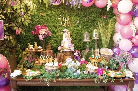 Loving this enchanting fairy themed birthday party! The dessert table is amzing! See more party ideas and share yours at CatchMyParty.com #catchmyparty #partyideas #fairyparty #woodlandparty #gardenparty #fairydesserttable #girlbirthdayparty #butterflies Fairy Table Decorations, Fairy Birthday Table, Fairy Dessert Table Ideas, Fairy Party Dessert Table, Enchanted Dessert Table, Fairy Birthday Table Decor, Enchanted Garden Dessert Table, Enchanted Forest Theme Dessert Table, Fairy Themed Dessert Table