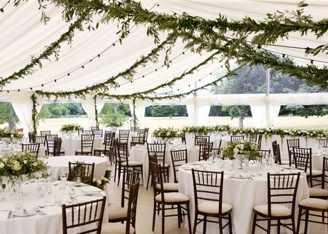 Internal wedding marquee with foliage hanging from the ceiling and strings of festoon lights. Clear windows let in lots of natural light - at Sibton Park, Yoxford in Suffolk Hanging Lights Wedding Reception, Marquee Lights Wedding, Marquee Wedding Decoration, Marquee Decoration, Open Air Wedding, Garden Marquee, Wedding Ceiling, Lights Wedding Decor, Marquee Lights