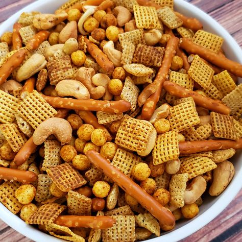 Learn how to make the best Gluten Free Chex Mix recipe. I make this salty snack recipe regularly for my family and for special occasions. It's a big batch that goes a long way and it's totally kid-friendly! Next time you need a delicious gluten free snack or appetizer, give this classic Chex mix recipe a try! Low Fat Chex Mix Recipes, Homemade Gluten Free Chex Mix Recipe, Gluten Free Fall Chex Mix Recipes, Gf Chex Mix Recipe, Gluten Free Snack Mix Recipes, Gluten Free Chex Mix Recipes, Healthy Chex Mix, Gluten Free Snack Mix, Salty Snack Recipes