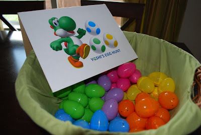 Super Mario Birthday Party- Yoshi's egg hunt (fill with chocolate coins, fire balls and jelly beans) Super Smash Bros Party, Nintendo Birthday Party, Arcade Birthday, Yoshi Egg, Super Mario Brothers Birthday, Mario Brothers Birthday Party, Mario Kart Party, Mario Bros Birthday Party Ideas, Nintendo Party