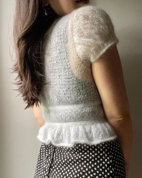 the #TiedAndTrueCardigan knitting pattern is out tomorrow!!! with both long-sleeve & puff-sleeve instructions in one pattern. a super special, lightweight, and delicate top for special occasions or just any time you want to feel special 🥰 the pattern is graded for 9 sizes from 28” - 62” busts but includes tons of tips for customizing it to your unique shape. keep an eye out for some of my stunning test knitters’ work i’ll be sharing this week!! this sample is knit in 1 strand of @berrocoyarn... How To Knit Puff Sleeves, Knitting Puff Sleeves Pattern, Cozy Hand-knitted Knit Tops, Spring Puff Sleeve Knit Top, Puff Sleeve Sweater Knit Pattern, Cord Ties, Mohair Cardigan, Double Pointed Needles, Peplum Hem