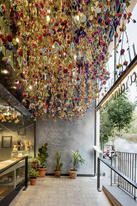 A famous name scores with another winner at Barcelona's new ode to the contentedness of village living... Flower Cafe, Flower Ceiling, Coffee Shop Interior Design, Decoration Restaurant, Rustic Cabinets, Coffee Shops Interior, Coffee Shop Design, Rustic Doors, Cafe Interior Design