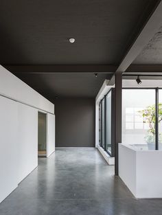 Basement Industrial Black And White, Dark Ceiling, Grey Ceiling, Office Ceiling, Minimal Lighting, Dark Walls, Black Ceiling, Grey Flooring, White Ceiling