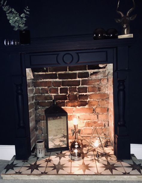 Fireplaces With Candles Inside, Lanterns In Fireplace, Fireplace Candles Inside, Wood Burner Fireplace, Lanterns Fireplace, Brick Hearth, Boho Lounge, Black Fireplace, Candles In Fireplace