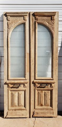 Pair of Wood Doors with Arched Single Glass Panes French Style Doors Interior, Unique French Doors, Antique Arched Doors, Arched Barn Doors In The House, Antique Wood Doors Interior, Antique Doors In House Entrance, Arched Sliding Doors Interior, Antique French Front Doors, Vintage Wood Doors