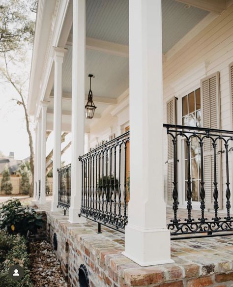 Porch Pillars Columns, Colonial Farmhouse Exterior, Tennessee Farmhouse, Wrought Iron Porch Railings, Iron Railings Outdoor, Front Porch Landscape, Greek Homes, Porch Pillars, Southern Colonial