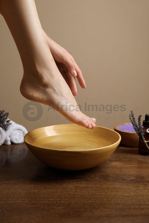 Woman holding her foot over bowl with water, closeup. Pedicure procedure Pedicure Procedure, Hand Health, Free Woman, Spa Therapy, Silky Skin, Foot Spa, Womens Wellness, Beauty Body, Cosmetology