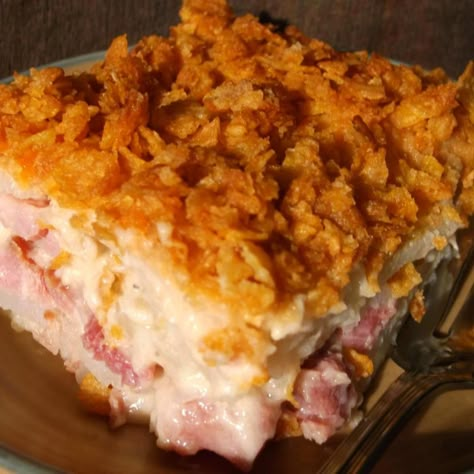 This is one of my favorite casseroles that I've created over the years. It's a delicious, creamy, cheesy ham and potato casserole with a crunchy, buttered cornflake topping. It's a great recipe for making the most of your leftover Easter ham! We love it and I'm confident that you will too. Cheesy Ham And Potato Casserole, Cream Of Onion Soup, Ham And Potato Casserole, Ham Dishes, Cheesy Ham, Ham Potato, Easter Ham, Slow Cooker Ham, Ham Casserole