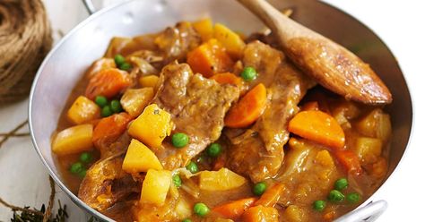 Using forequarter chops makes this slow-cooked lamb and vegetable stew budget-friendly! Ultimate Beef Stew, Boneless Short Ribs, Classic Beef Stew, Ina Garten Recipes, Slow Cooked Lamb, Carrots And Potatoes, Vegetable Stew, Beef Stew Recipe, Professional Stylist