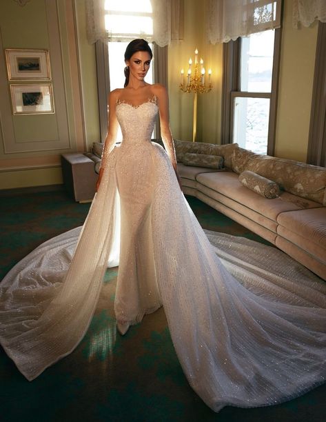 This Dovita princess wedding dress features a spectacular two-piece effect covered in thousands of refined embellishments throughout the entire gown with illusion sleeves and long train. Wedding Dress With Removable Train, Dress With Removable Train, Princess Bride Costume, October Wedding Dresses, Illusion Neckline Wedding Dress, Bella Bridal, Backless Bridal Gowns, Beaded Tulle, Beaded Blouse