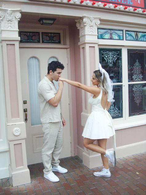 Engagement Photos At Disney World, Disney Springs Engagement Photos, Disney Proposal Pictures, Disney World Engagement Pictures, Disney Honeymoon Outfits, Boardwalk Photos, Disneyland Engagement Pictures, Disneyland Couples Pictures, Disneyland Photoshoot