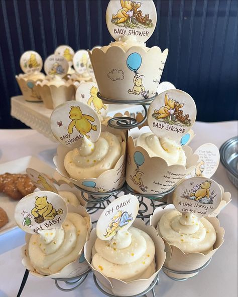 🍯🍼Just had the cutest Winnie the Pooh themed baby shower! The Hundred Acre Wood decorations were adorable and the honey pot favors were a sweet touch. Is this the sweetest theme or what??🍯🍼 #WinnieThePooh #BabyShower #BabyShowerTheme #diy #ShowerIdeas #WeLiketoParty #HundredAcreWood #HoneyFavors #WinniethePoohCake #Cupcakes Winnie The Pooh Baby Shower Cupcakes, Cupcakes Winnie Pooh, Classic Pooh Cupcakes, Winnie The Pooh Cupcakes, Honey Pot Favors, Hunny Pot Cupcakes Winnie The Pooh, Honey Pot Winnie The Pooh Party Favors, Winnie The Pooh Honey Pot Cake, Lucas Baby