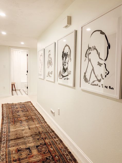 Mix it up! 10 Ways to Display Art in your Home. - Chris Loves Julia Wall Art Hallway, Art Hallway, Hallway Gallery Wall, Rug Over Carpet, Hallway Art, Chris Loves Julia, Layered Art, Oversized Art, Simply White