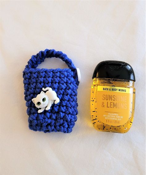 Crochet Hand Sanitizer Holder, cotton yarn, white kitten button Crochet Sanitizer Holder, Crochet Hand Sanitizer Holder, Crochet Hand Sanitizer, Sanitizer Holder, Hand Sanitizer Holder, White Kitten, Blue Crochet, White Kittens, Crochet Wrap