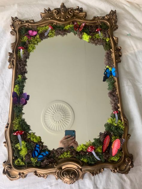 I made a moss mirror! Inspired by @nonbinaryfairie and @carolinequinner on TikTok Enchanted Forest Mirror Diy, Cute Mirror Frame Ideas, Moss And Crystal Mirror, Moss Art Mirror, Mirror With Moss Frame, Moss Mirror Full Length, Moss Framed Mirror, Fairy Garden Mirror Diy, Mirror Moss Art