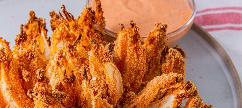 Air Fryer Bloomin' Onion - Delish.com Onion Blossom Recipe, Air Fryer Blooming Onion, Onion Blossom, Baked Blooming Onion, Fried Onion Rings, Blooming Onion Recipes, Frying Recipes, Grilled Onion, Lord Prayer