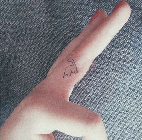 Micro Dinosaur Tattoo, Long Neck Dinosaur Tattoo, Tattoo Ideas Dinosaur, Brontosaurus Tattoo, Small Dinosaur Tattoo, Lucy Tattoo, Funny Small Tattoos, Dinosaur Outline, Tattoos 2024