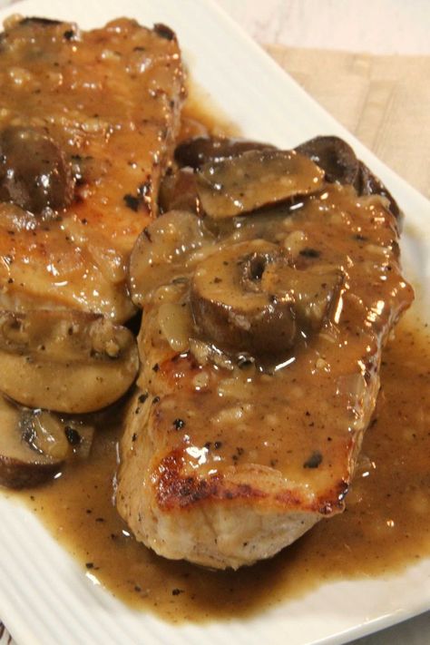 Pork Chops with Mushrooms and Onions Crockpot Onion Pork Chops, Pork Chops With Mushroom Sauce, Pork With Mushroom Sauce, Pork Loin With Mushrooms, Pork Chop Recipes With Mushrooms, Pork Chops With Mushrooms And Onions, Pork Chop Mushroom Recipes, Pork Chop And Mushroom Recipes, Golden Mushroom Pork Chops