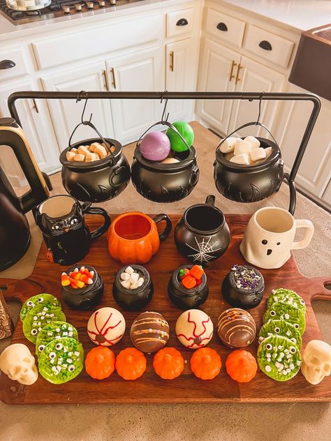 Haunted Hot Cocoa Bar with ingredients in cute mini cauldrons. Hot Cocoa Halloween, Halloween Hot Chocolate Station, Hot Chocolate Bar Halloween, Halloween Cocoa Bar, Fall Hot Chocolate Bar Ideas, Halloween Hot Cocoa Bar, Fall Hot Cocoa Bar, Hot Chocolate Bar Fall, Fall Hot Chocolate Bar