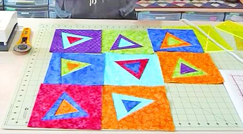 This is a very different approach to quilting. These wonky quilts are so much fun, and you can use up a lot of those scraps you have laying around for this one. There are so many variations of these quilts and you can make up your own patterns as you go along. Her triangle wonky quilt starts w Wonky Quilt Blocks, Improv Quilting, African Quilts, Quilt Modern, Quilt Block Tutorial, Triangle Quilt, Contemporary Quilts, Scrappy Quilts, Quilt Block Patterns