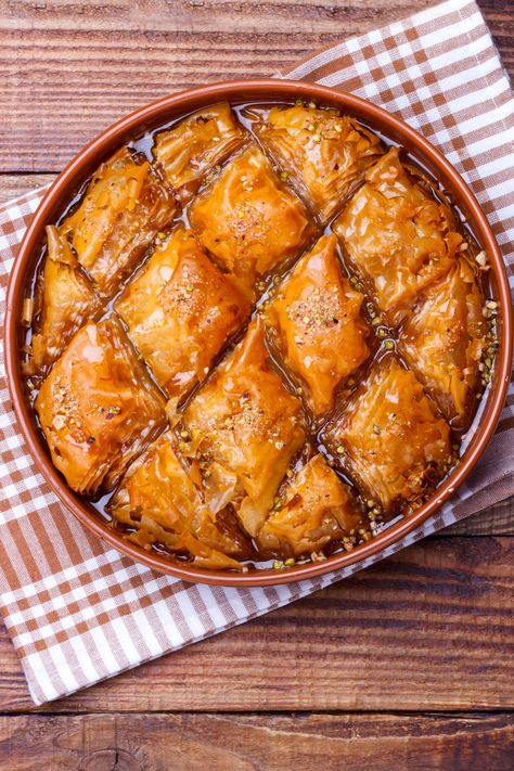 Pioneer Woman's Baklava is made with phyllo dough, nuts, cinnamon, butter, honey, water, sugar, and vanilla extract resulting in a sweet dessert that takes an Pioneer Woman Baklava Recipe, Jewish Rye Bread, Pioneer Kitchen, Baklava Recipe, Honey Water, Butter Honey, Cinnamon Butter, Phyllo Dough, Rye Bread