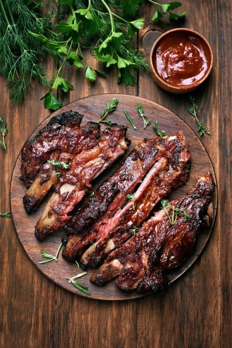 The Secret To Moist, Tender, Fall-Off-The-Bone Ribs Every Time - BlackDoctor.org - Where Wellness & Culture Connect Barbecue Pork Ribs, Bbq Pork Ribs, Rib Meat, Barbecue Ribs, Easy Bbq, Bbq Sauce Recipe, Wooden Plate, Bbq Ribs, Bbq Pork