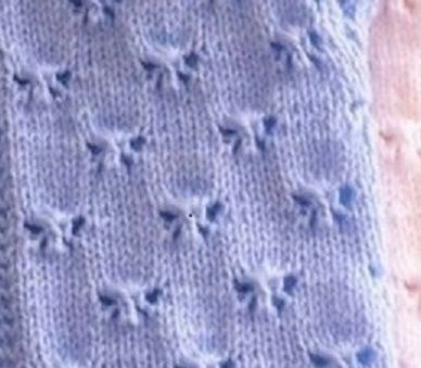 looks like butterflies:   I did not know how to send you a picture of a knit stitch of a pattern I would like.  Do you know how to do this or maybe you could design a sweater Butterfly Bobble Stitch Pattern, Knitted Butterfly Free Pattern Easy, Knit Butterfly Stitch, Knit Stitch Vs Purl Stitch, Knit Butterfly Top, Butterfly Sweater, Butterfly Stitches, Lace Knitting Patterns, Blanket Knitting Patterns