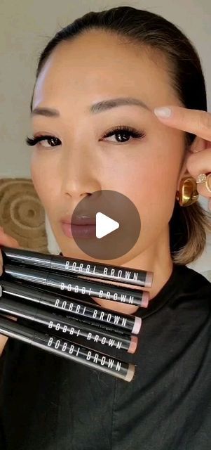 Tiffany Lee 🇰🇷 Empowering YOU to Radiate ✨️ on Instagram: "Easy 3-step Soft Golden Brown Smokey Eye  Comment EYES, and I'll send you the exact shades I used!  Bobbi Brown LONG-WEAR CREAM SHADOW STICK: -MICA (inner lash base) -GOLDEN AMBER (outer lash base & inner corner) -ESPRESSO (outer lash line)   A swipe-and-go cream eye shadow glides on with ease for 24 hours of instant, effortless eyes. Prime, line, define, or highlight with buildable shades and three finishes to complement all skin tones, eye shapes, and looks.  #eyeshadow #eyeshadowsticks #bobbibrown #waterproof #makeupreels #shorts #makeupshorts #easymakeup #makeuphack #makeuphacks  #makeupover40 #smokeyeye" Eyeshadow For Brown Eyes Step By Step, Bobbi Brown Eyeshadow Stick Tutorial, Asian Eyeshadow Looks, Eye Shadow Stick Tutorial, Eyeshadow Stick Tutorial, Eye Shadow Tutorial Step By Step, Soft Smokey Eye Makeup Tutorial, Bobbi Brown Eyeshadow Stick, Bobbi Brown Makeup Looks