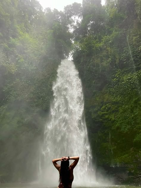 Nungnung Waterfall Bali, Forest Travel Aesthetic, Lush Green Aesthetic, Bali Holiday Aesthetic, Travel Aesthetic Nature, Nature Trip Aesthetic, Waterfall Aesthetic Girl, Travel Instagram Aesthetic, Jungle Girl Aesthetic