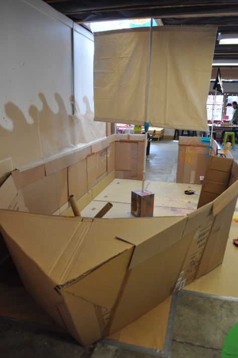 Cardboard and canvas pirate ship for Smartypants in North Portland. Created with post-consumer cardboard, health hot glue and paper tape. Kids are welcome to paint and play in the pirate ship. March 2016. Pirate Ships Diy, Cardboard Boats, Cardboard Pirate Ship, Vbs Shipwrecked, Shipwrecked Vbs, Cardboard Boat, Mystery Island, Pirate Theme Party, Pirate Halloween