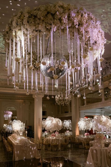 Dance under an extravagant floral chandelier, adding luxury and charm to the celebration. Disco Ball Wedding, Ceiling Wedding, Luxury Event Design, Floral Ceiling, Wedding Floral Ideas, Dance Floor Wedding, Wedding Chandelier, Ball Wedding, Floral Chandelier