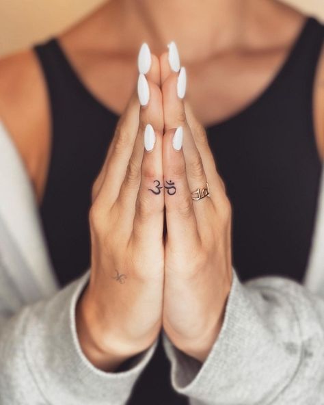 Growth And Change Tattoos, Spiritual Finger Tattoos For Women, Om Tattoo Designs, Om Tattoo Design, Small Finger Tattoos, Finger Tattoo For Women, Ankle Tattoos For Women, Hand And Finger Tattoos, Finger Tattoo Designs