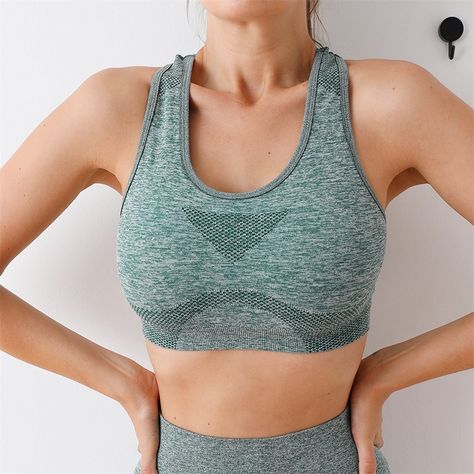 Say goodbye to discomfort and chafing with our breathable, moisture-wicking fabric, engineered to keep you cool and dry throughout your workout. Plus, our sports bra's seamless design minimizes irritation, ensuring a smooth, comfortable fit every time you wear it. But the benefits don't stop there—our Sports Bra also offers long-term support for your breast health. By minimizing bounce and providing proper alignment, it helps reduce strain on your delicate breast tissue, promoting overall co... Womens Yoga Clothes, Green Bras, Sports Bra Top, Top Bra, Blue Bra, Running Vest, Yoga Sports Bra, Seamless Sports Bra, Women Sports