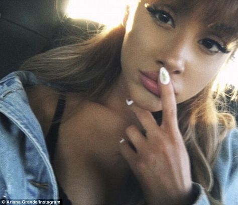 Selfie enthusiast: The Into You hitmaker was also likely selected thanks to her impressive, captive combined 153.8M followers on social media Ariana Grande, A Woman, Nails, Hair