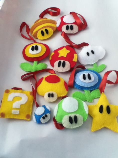 Diy Video Game Ornaments, Mario Felt Pattern, Felt Mario Ornaments, Nerdy Felt Crafts, Mario Sewing Projects, Mario Sewing Pattern, Super Mario Diy Crafts, Mario Xmas Tree, Diy Mario Ornaments