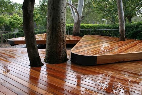 Once the decking is complete, you can apply a wood stain or sealer to protect it from the elements and enhance its appearance.
#Tags:

#DIYDeck
#OutdoorProjects
#TreeDeck
#FloatingDeck
#GardenDesign
#DeckBuilding Outdoor Rooms Patio, Deck Around Tree, Decks Designs, Modern Decks, Deck Around Trees, Bench Around Trees, Spotted Gum Decking, How To Landscape, Building A Floating Deck