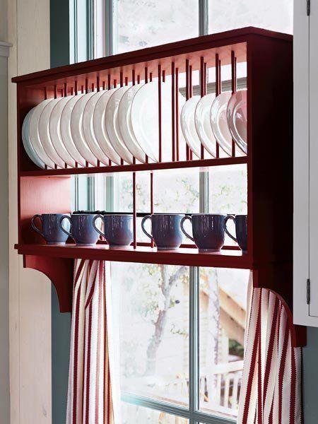 We saw this photo on the Coastal Living website and it reminded us of our post yesterday on plates that don't fit in standard cabinets. This is one solution... Organiser Cucina, Small Kitchen Organization, Kitchen Necessities, Small Kitchen Storage, Plate Storage, Sink Ideas, Plate Rack, Diy Kitchen Storage, Small Space Storage