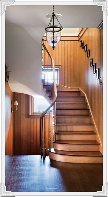 In the hall of a Martha’s Vineyard residence by architect Oscar Shamamian and designer Victoria Hagan, the floor, staircase, and beadboard paneling are of American white oak. Single-arm sconces from Circa Lighting illuminate the curved stairwell. (February 2011) Beadboard Stairwell, Stairwell Ideas, Victoria Hagan, Beadboard Paneling, Staircase Railing, Staircase Railing Design, Staircase Ideas, Mud Rooms, Staircase Wall