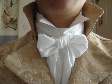 nstead of a couple of basic ways to tie that already nicely formed strip of silk that’s decorated in a rank suitable fashion, the Regency buck (or at least his man) was expected to be familiar with a far more numerous array of styles.      Popular cravat styles during the Regency. Little Dorrit, Regency Dress, Regency Fashion, 19th Century Fashion, Period Outfit, Regency Era, Historical Costume, Historical Clothing, Belle Epoque