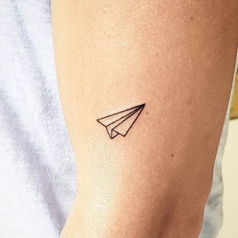 101 Best Paper Airplane Tattoo Designs You Need To See! 45 Outsons Paper Airplane Tattoo, Best Paper Airplane, Paper Airplane Tattoos, Paper Plane Tattoo, Popular Tattoo Designs, Small Symbol Tattoos, Feather Tattoo Meaning, Shoulder Sleeve Tattoos, Airplane Tattoo