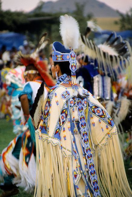 Ladies traditional Pow Wow dancer dressed in white brain tanned leather regalia with beautiful beaded strips and headdress crown at the Chippewa-Cree pow wow on the Rocky Boy Indian Reservation, Montana Cree Traditional Clothing, Pow Wow Dancers, Headdress Crown, Outfit Images, Buckskin Dress, Powwow Outfits, American Indian Clothing, Native Regalia, Native American Dance