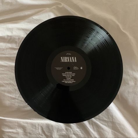 White background and a record vinyl by the famous grunge band nirvana Record Aesthetic Vinyl, Record Widget, Paramore Vinyl, Records On Wall Aesthetic, Alexander Aesthetic, Vinyl Widget, Nirvana Record, Vinyl Record Aesthetic, Vinyl Records Aesthetic