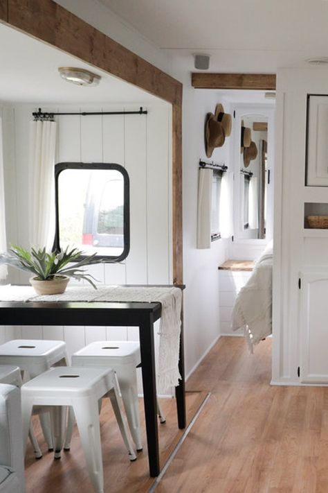 This Nashville Couple brings new life to outdated campers! Come see the before and after photos of their Forest River RV transformation! Featuring @bestofourtodays on MountainModernLife.com #campers #camperrenovation #rvremodel #rvrenovation #rvmakeover #modernrv #moderncamper #tinyhomeonwheels #tinyhometour Rv Tv Area Remodel, Aesthetic Trailer Interior, How To Paint Rv Walls, Renovated Rv Rv Interior, Rv Home Ideas, Rv Nursery Ideas, Camper Kitchen Ideas, Motor Home Interior, Cottage Rv