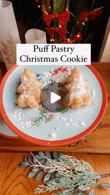 Tara Rondinelli on Instagram: "The easiest Christmas cookie! These puff pastry cookies are a must try this holiday season🌲😍  Here’s what you’ll need: *Package of puff pastry *Chocolate pieces *Powdered sugar  Here’s how to make them:  1️⃣Preheat oven for 400 degrees. 2️⃣Cut out tree shapes from the puff pastry dough.  4️⃣Put the first layer of dough on a pan, lined with parchment paper. 5️⃣Place a piece of chocolate on top of the first layer of dough. 6️⃣Place another layer of dough on top of the chocolate, pinching the pieces of dough together.  7️⃣Bake for about 12 minutes or until dough turns light brown. 8️⃣Let the cookies cool and sprinkle with powdered sugar✨  Enjoy!  Save this for later!  #christmasrecipes #holidayrecipes #christmascookies #diychristmas #easyrecipes #simplerecipes Puff Pastry Christmas Cookies, Christmas Puff Pastry Desserts, Puff Pastry Christmas Desserts, Puff Pastry Shapes, Puff Pastry Christmas Tree, Puff Pastry Chocolate, Puff Pastry Cookies, Easy Puff Pastry Desserts, Pastry Cookies