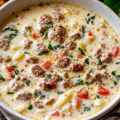 Indulge in this creamy, rich Parmesan Italian sausage soup with spinach. Perfect for any occasion. Easy to make in under 45 minutes! Creamy Parmesan Sausage Italian Soup, Italian Parmesan Soup, Slow Cooker Creamy Soup, Creamy Italian Parmesan Sausage Soup Crockpot, Crockpot Sausage Soup, Italian Sausage Crockpot Recipes, Creamy Parmesan Italian Sausage Soup, Crockpot Cheeseburger Soup, Crockpot Cheeseburger